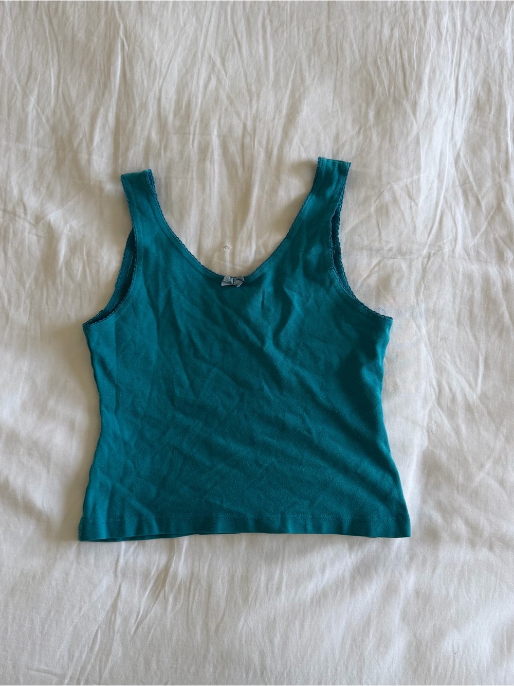 Teal blue tank top with bow detail
